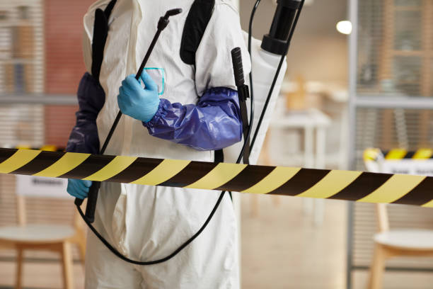 Professional Biohazard Cleanup technician working in Pembroke, MA